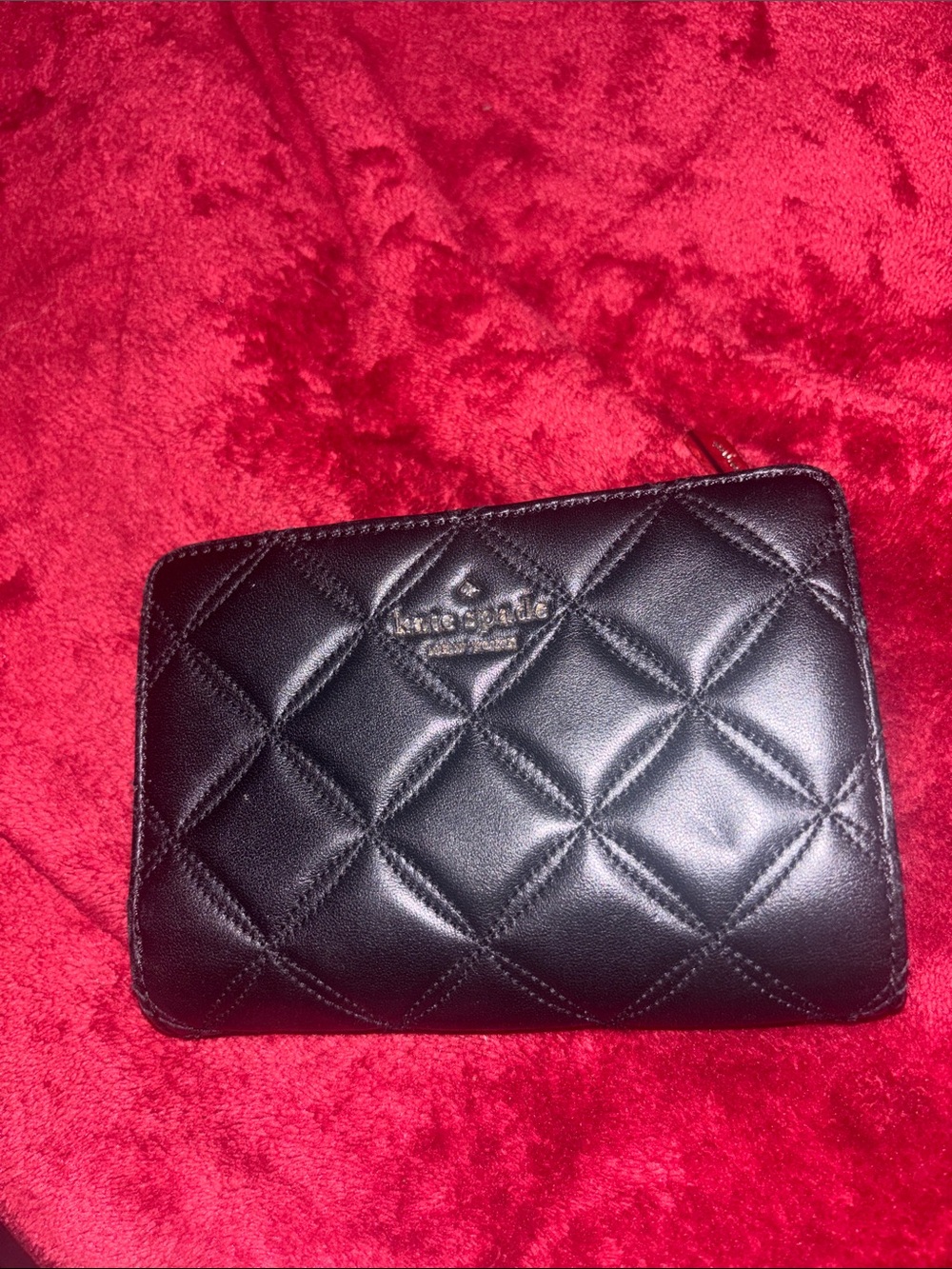 kate spade black quilted compact zip wallet with gold logo